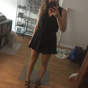 Black romper with surplice detail size small